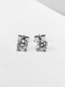 1.00ct Solitaire diamond stud earrings set with enhanced brilliant cut diamonds, SI3 clarity and H