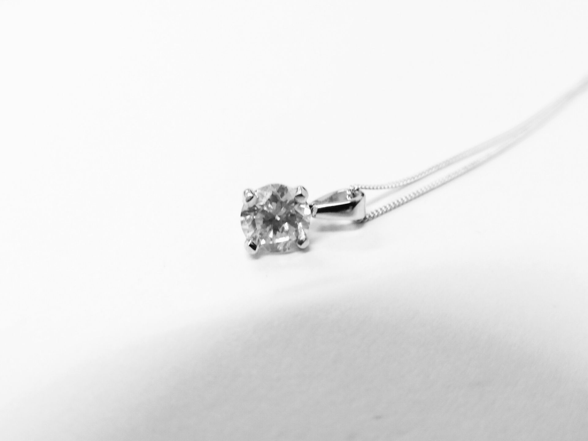 0.50ct diamond solitaire pendant set in 18ct gold. 4 claw setting, plain bale. Enhanced brilliant - Image 3 of 4