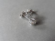 1.00ct Diamond solitaire earrings set with brilliant cut diamonds, I colour i1 clarity. Six claw
