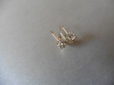 0.60ct diamond hinged style earrings each set with a brilliant cut diamond, H/I colour,Si2