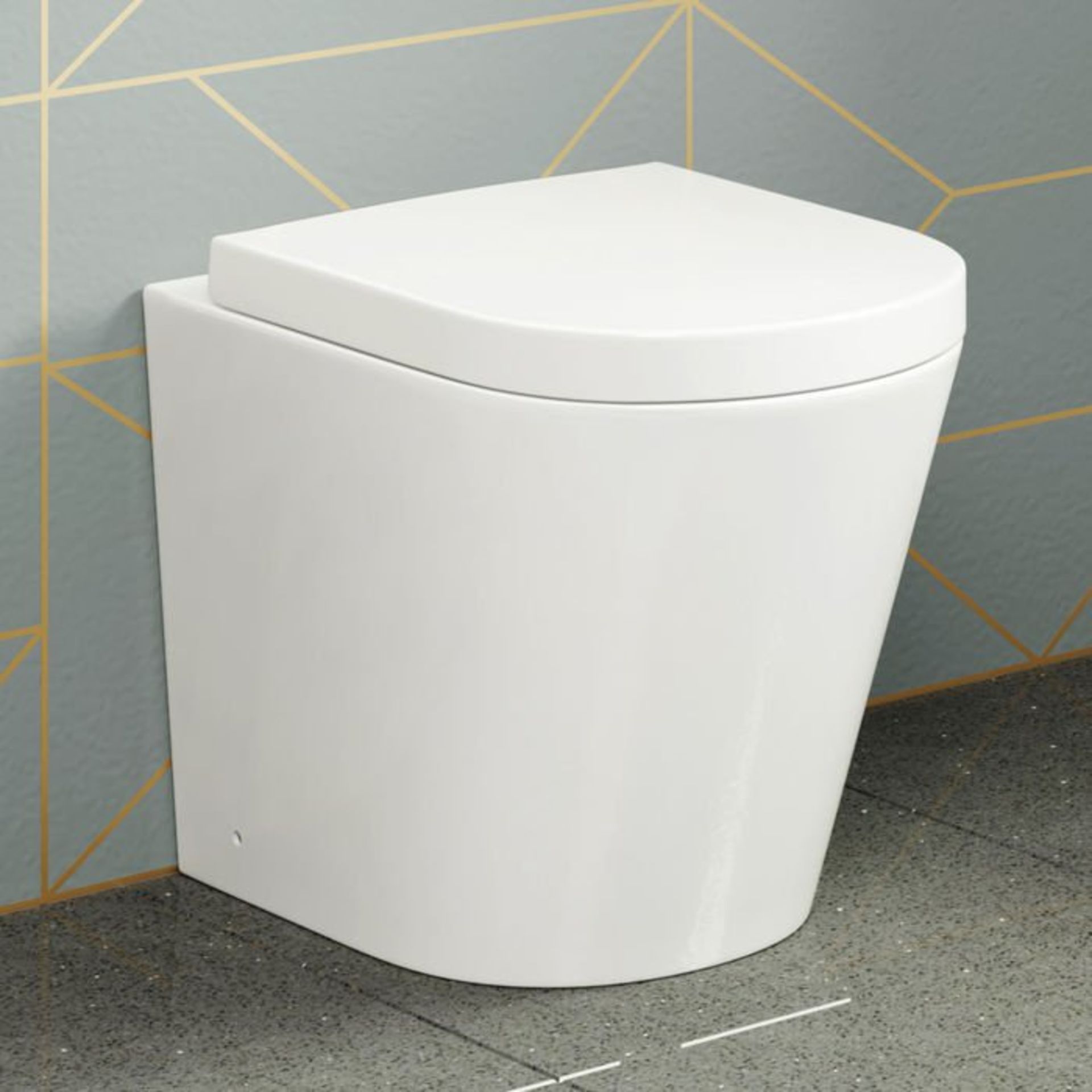 (U24) Lyon Back to Wall Toilet inc Luxury Soft Close Seat. Our Lyon back to wall toilet is made from