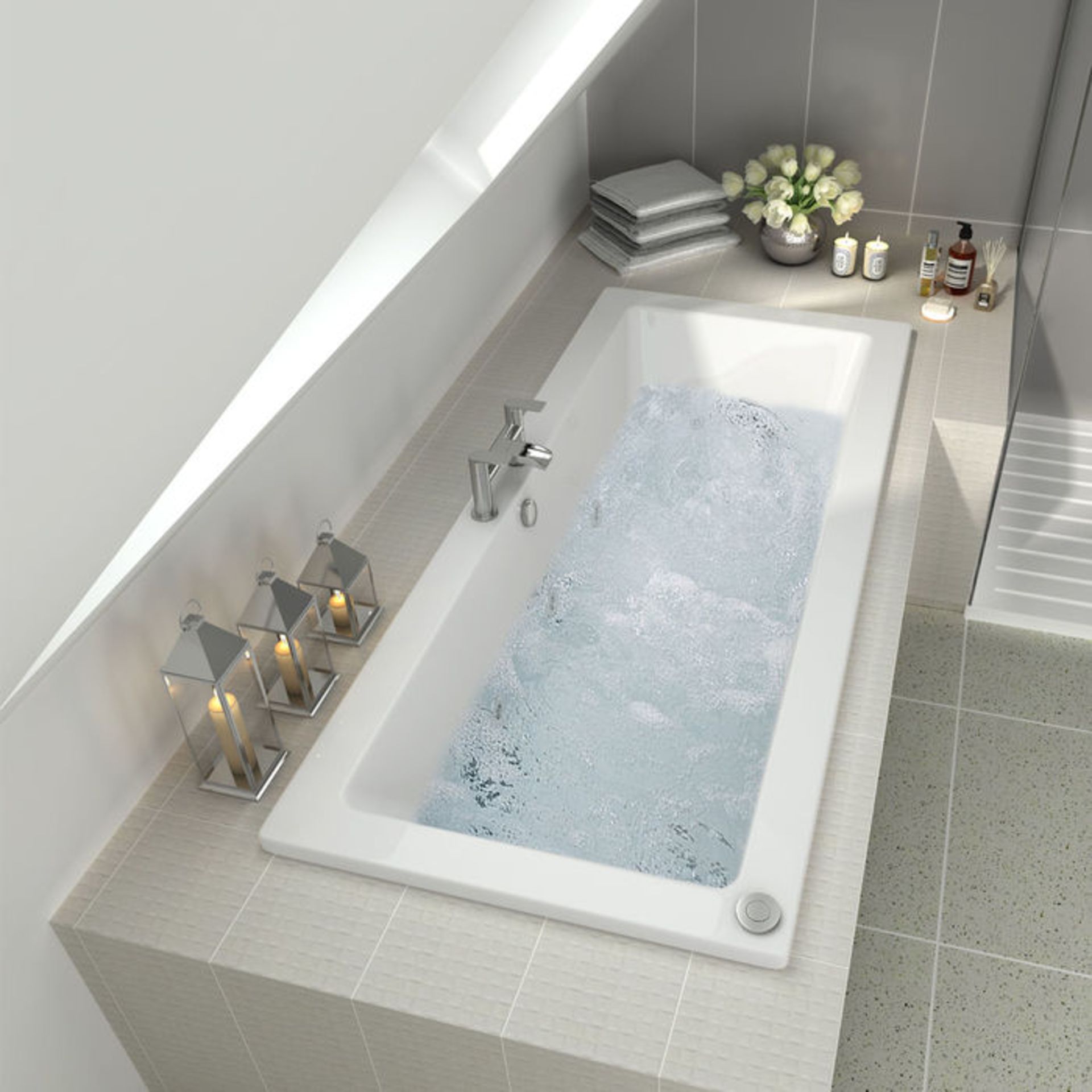 (PA12) 1700x750x545mm Whirlpool Double Ended Bath - 14 Jets. We love this because it feels as though