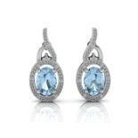 9ct White Gold Diamond And Blue Topaz Earring 0.05