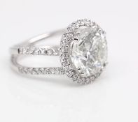 18ct White Gold Single Stone With Halo Setting Ring 9.00