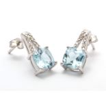 9ct White Gold Diamond And Blue Topaz Earring 0.05