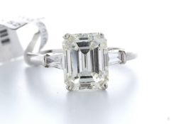 18ct White Gold Single Stone Emerald Cut Diamond Ring With Baguette Shoulders 3.19