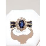 14ct Diamond and Sapphire swt Cluster ring. 10x Diamonds with Oval and Princess cut