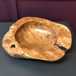 Wooden bowl. Made from natural teak root from Indonesia