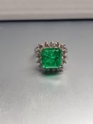 Ring in white gold and Square cut emerald.