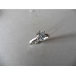 0.70ct Diamond solitaire ring with a brilliant cut diamond, i colour and i1-2 clarity. Set in