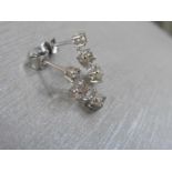 1.20ct diamond trilogy drop earrings. I-J colour, si2 clarity weighing 1.20ct total. Claw setting in