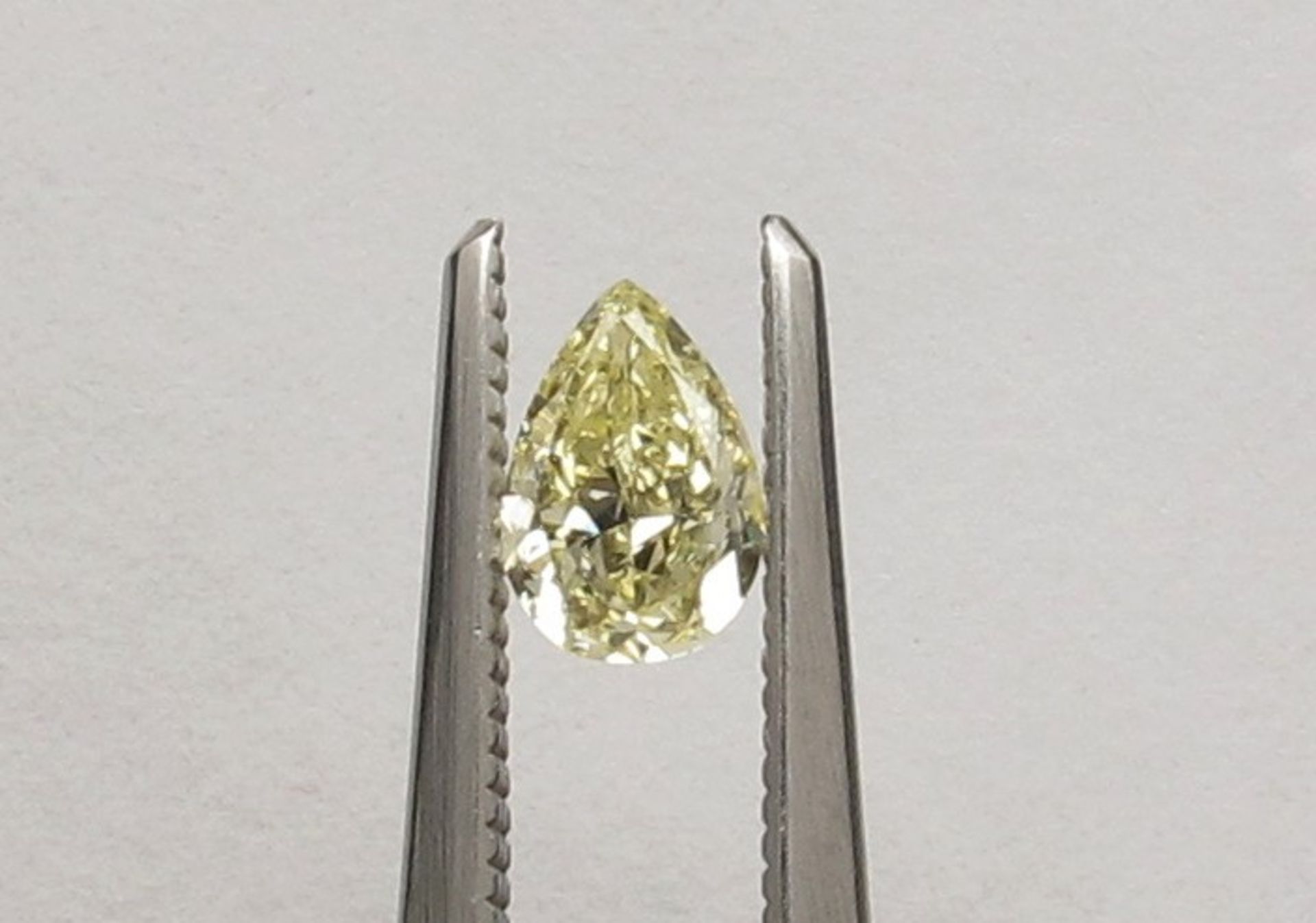 An unmounted Pear-shaped diamond weighing app. 0.5ct.