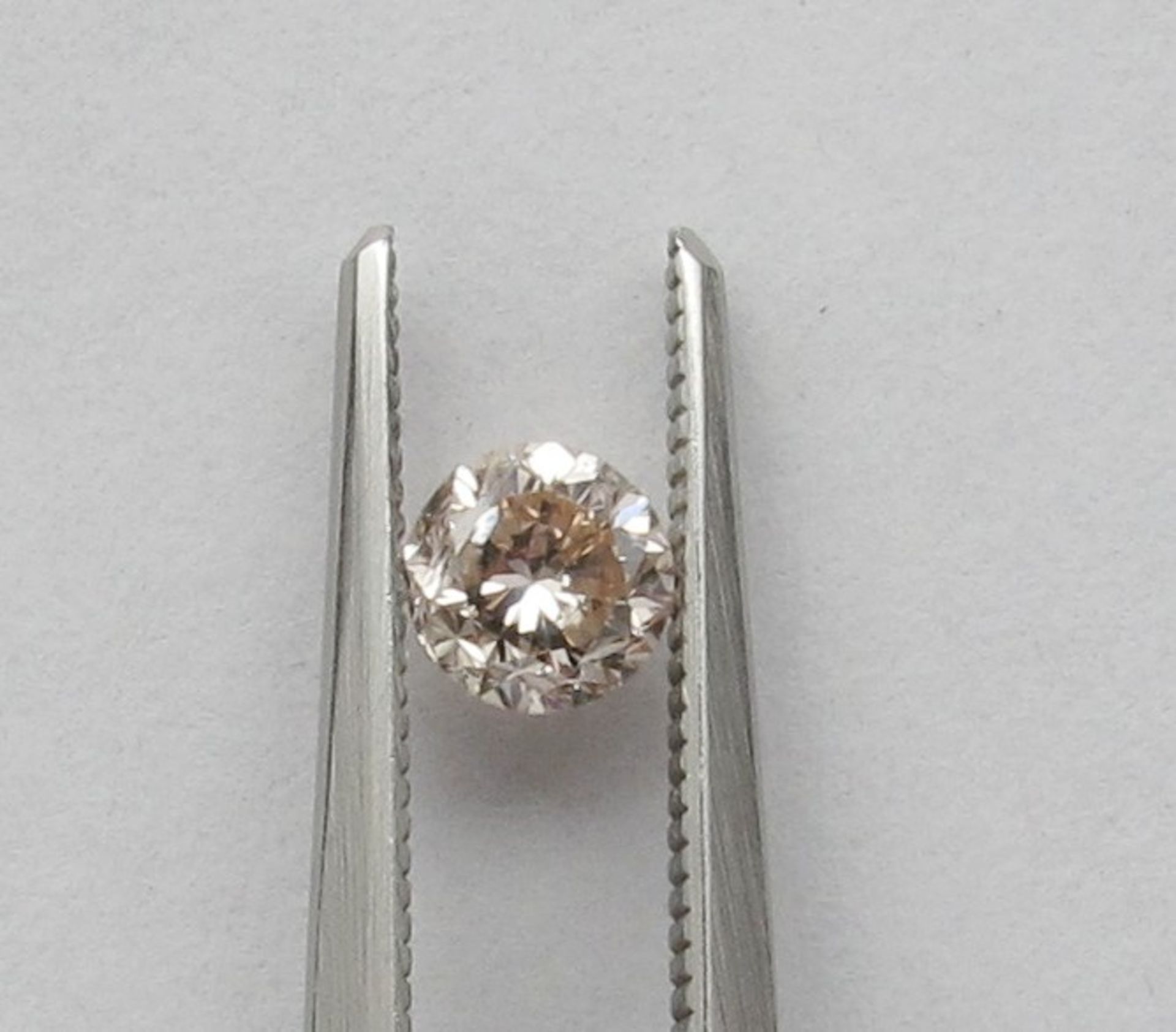 An unmounted Round-shaped diamond weighing app. 0.55ct.