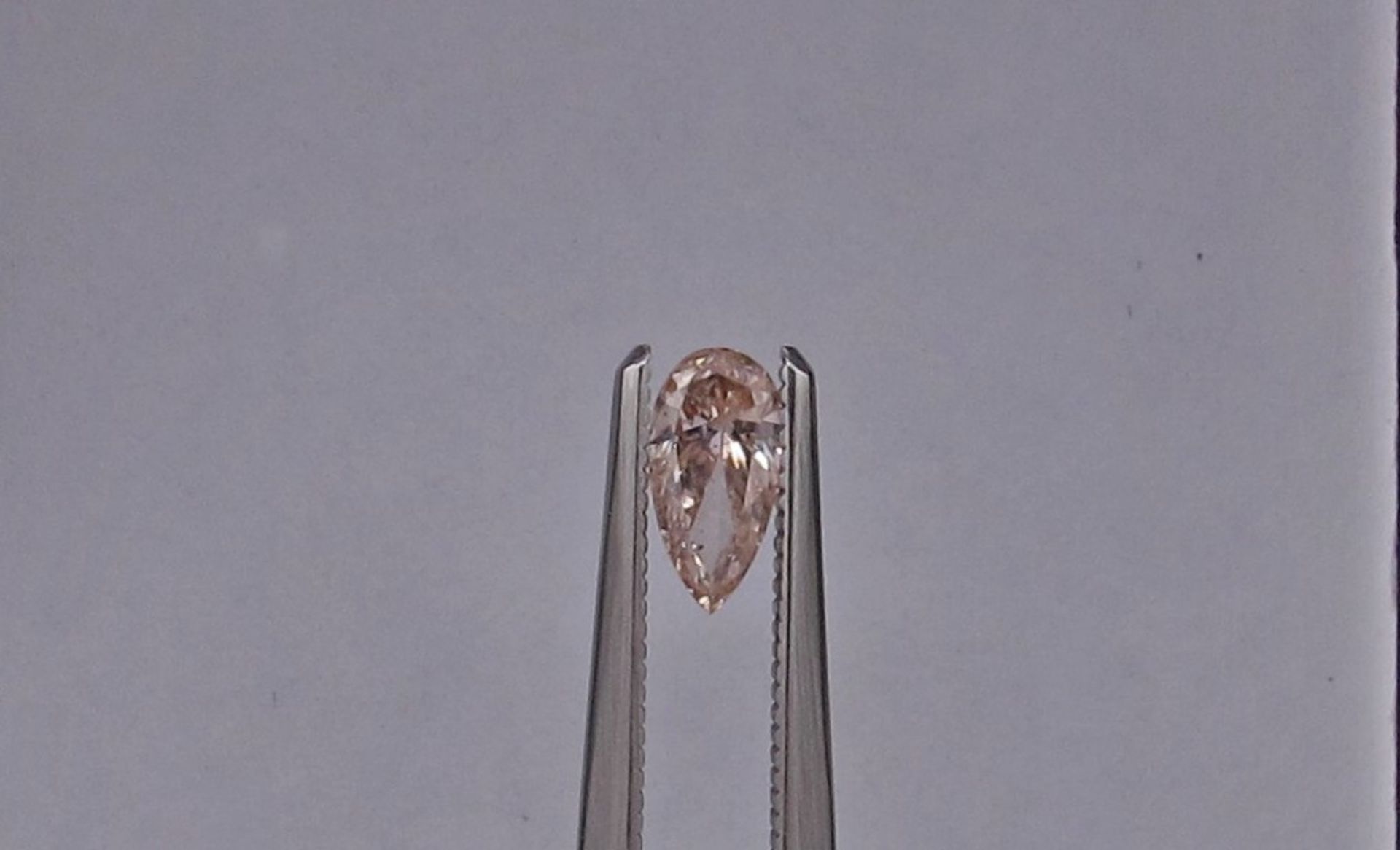 An unmounted Pear-shaped diamond weighing app. 0.43ct.