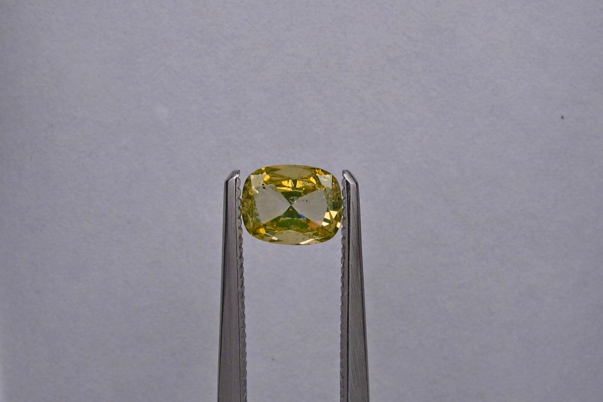 An unmounted Cushion-shaped diamond weighing app. 0.48ct