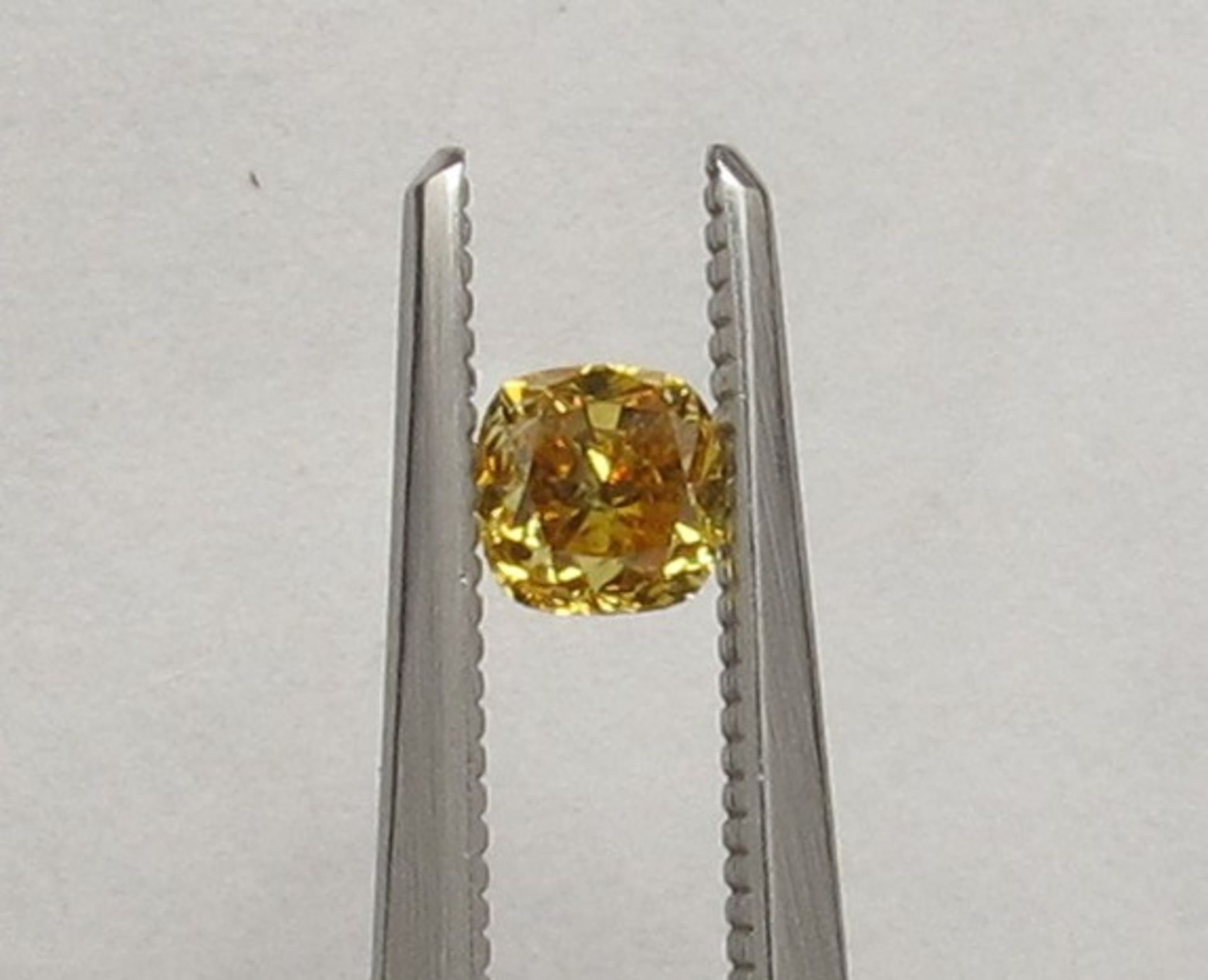 An unmounted Cushion-shaped diamond weighing app. 0.37ct.