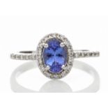 18ct White Gold Diamond And Tanzanite Halo Setting Ring 0.15