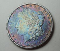 1885 Morgan Rainbow Silver Dollar