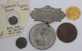 Group of old coins and medallion