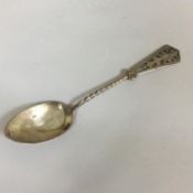 An Art Nouveau solid sterling HM silver twist stem teaspoon with ornate finial