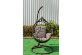 Spider Pod Swing Chair in Brown. The Spider free standing rattan pod chair with cushions and stand