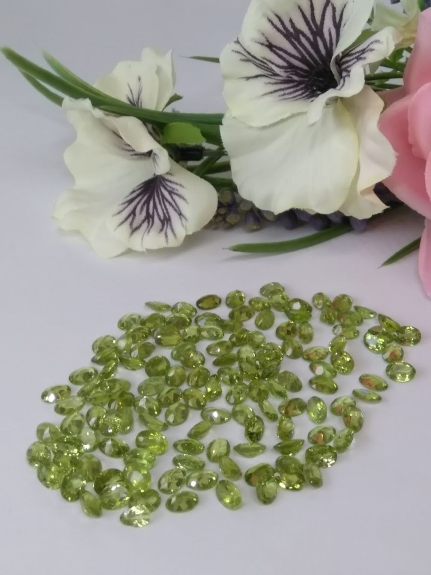 IGL&I Certified 105 Cts 130 pieces Natural Peridot Gemstones - Transparent