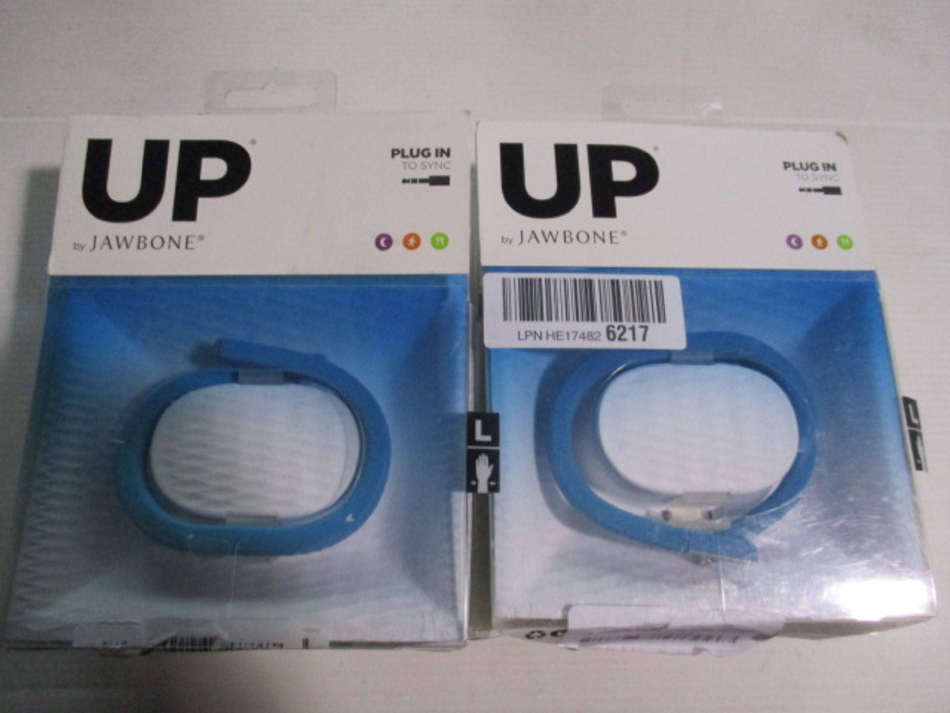 2 x UP by Jawbone systems as pictured boxed and unchecked