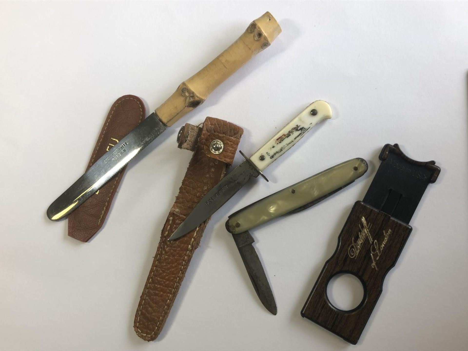 A Davidoff of London cigar cutter together with a group of vintage pocket knives or fruit knives - Image 2 of 4