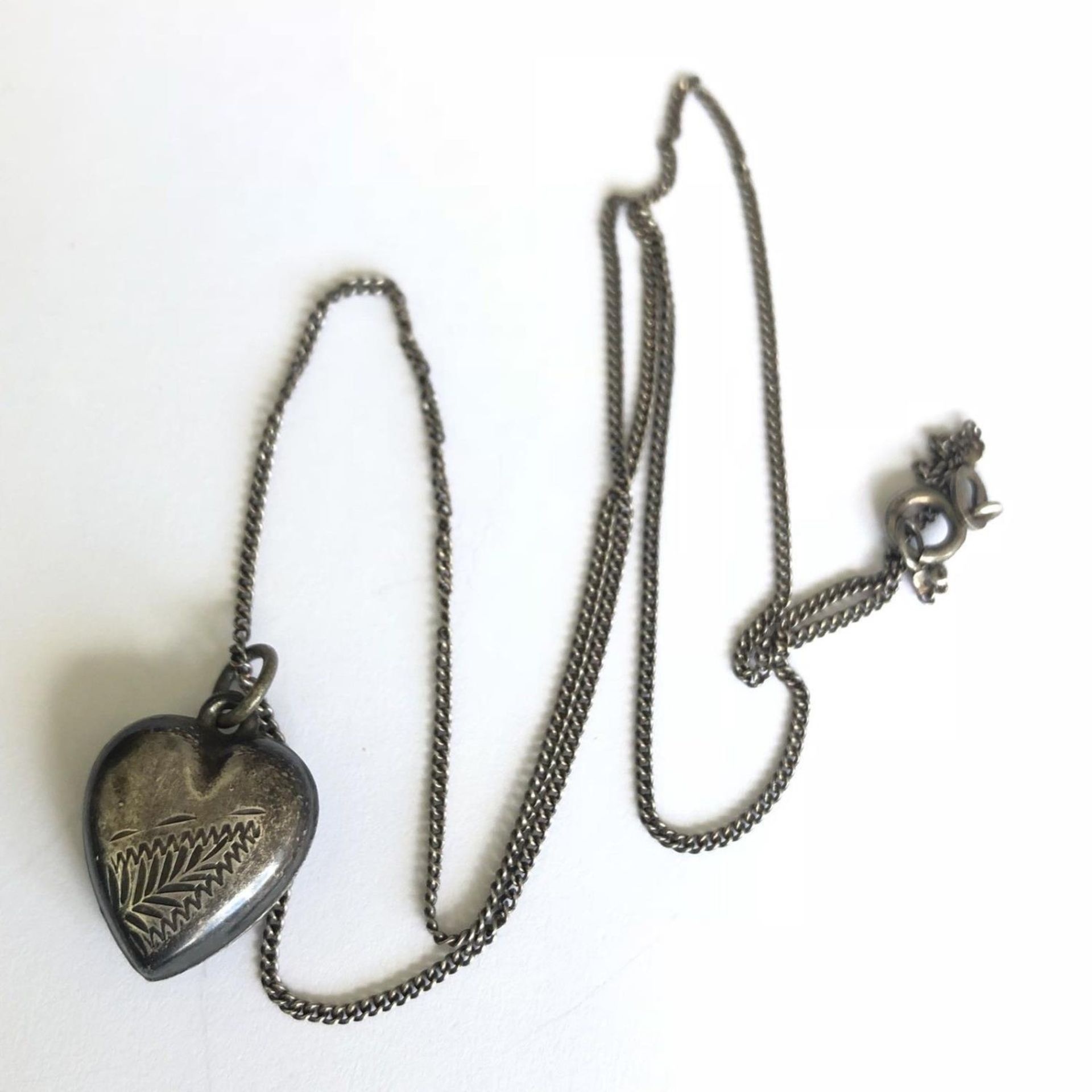 Sterling Silver Heart Pendant on a Long Chain Necklace