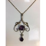 Art Deco 9ct Gold pendant set with two natural mystical amethyst gemstones