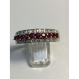 Ruby and diamond ½ eternity ring