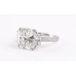 18ct White Gold Three Stone With Radiant Cut Centre Claw Set Diamond Ring 5.00