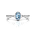 9ct White Gold Diamond And Oval Shape Blue Topaz Ring 0.01