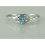 9ct White Gold Fancy Cluster Diamond Blue Topaz Ring 0.01