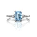 9ct White Gold Diamond And Emerald Cut Blue Topaz Ring 0.04