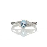 9ct White Gold Fancy Cluster Diamond And Blue Topaz Ring 0.01