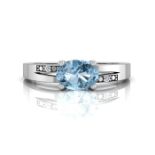 9ct White Gold Diamond And Blue Topaz Ring 0.01