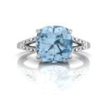 9ct White Gold Cushion Cut Blue Topaz With Diamond Set Shoulders Ring 0.06