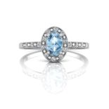 9ct White Gold Oval Cluster Diamond And Blue Topaz Ring 0.09