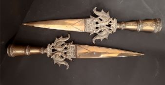 Antique Vintage Pair of Heavy Brass Ornamental Swords With Middle East Influence.