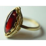 Lady's 9ct Gold Ring With Reddish Brown Stone