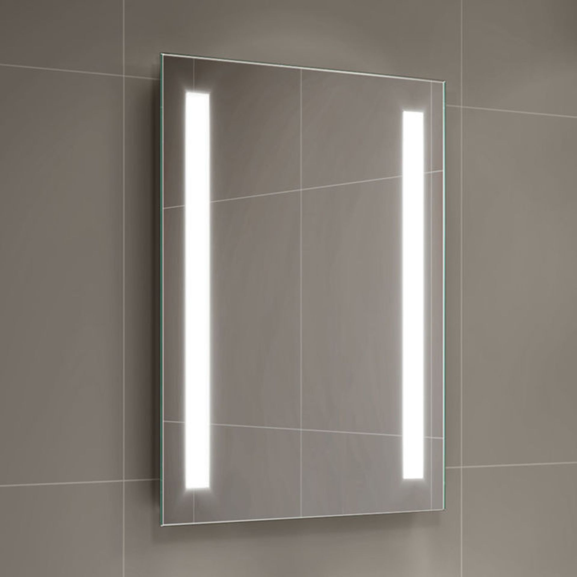 (P64) 500x700mm Omega Illuminated LED Mirror - Battery Operated. Energy saving controlled On / Off