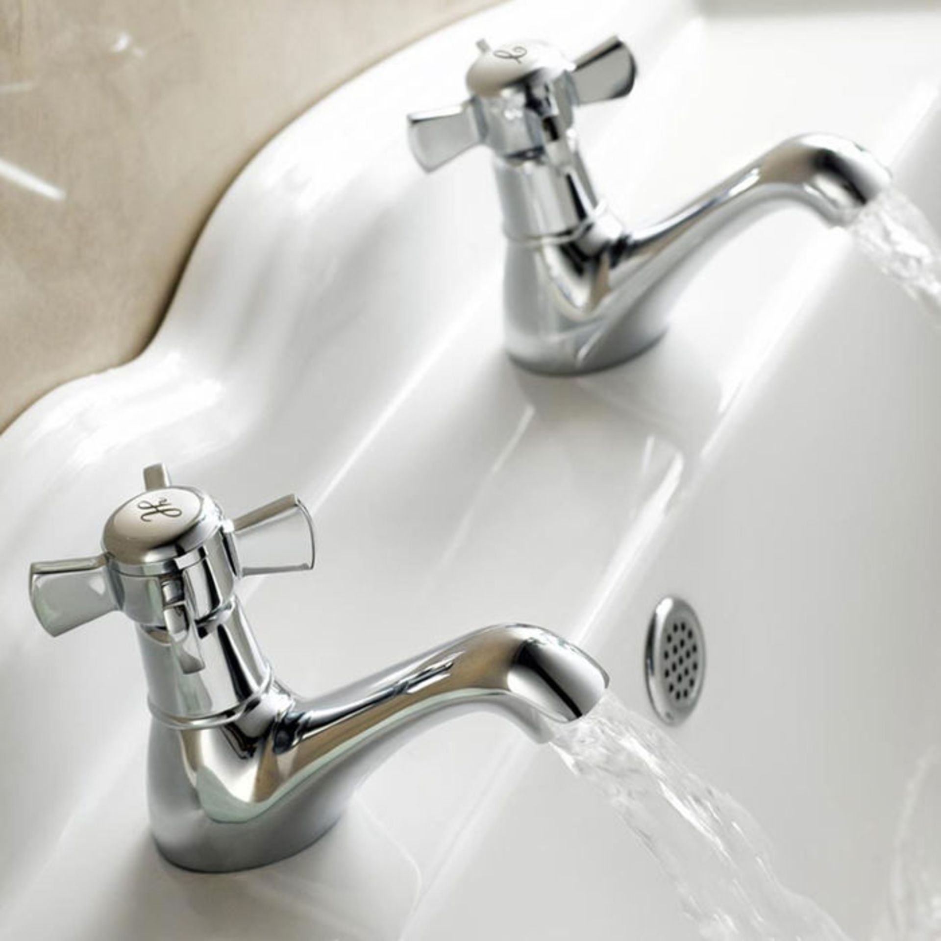 (TA114) Loxley Traditional Hot and Cold Basin Taps Engineered from premium solid brass which is