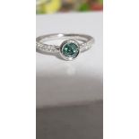 Ring in white gold set with diamonds totaling 0.50 ct