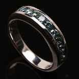 Alliance ring with 0.70ct blue diamonds