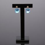 Earrings in 14K yellow gold with topaz and diamonds