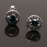 Earrings in white gold and fancy blue diamonds