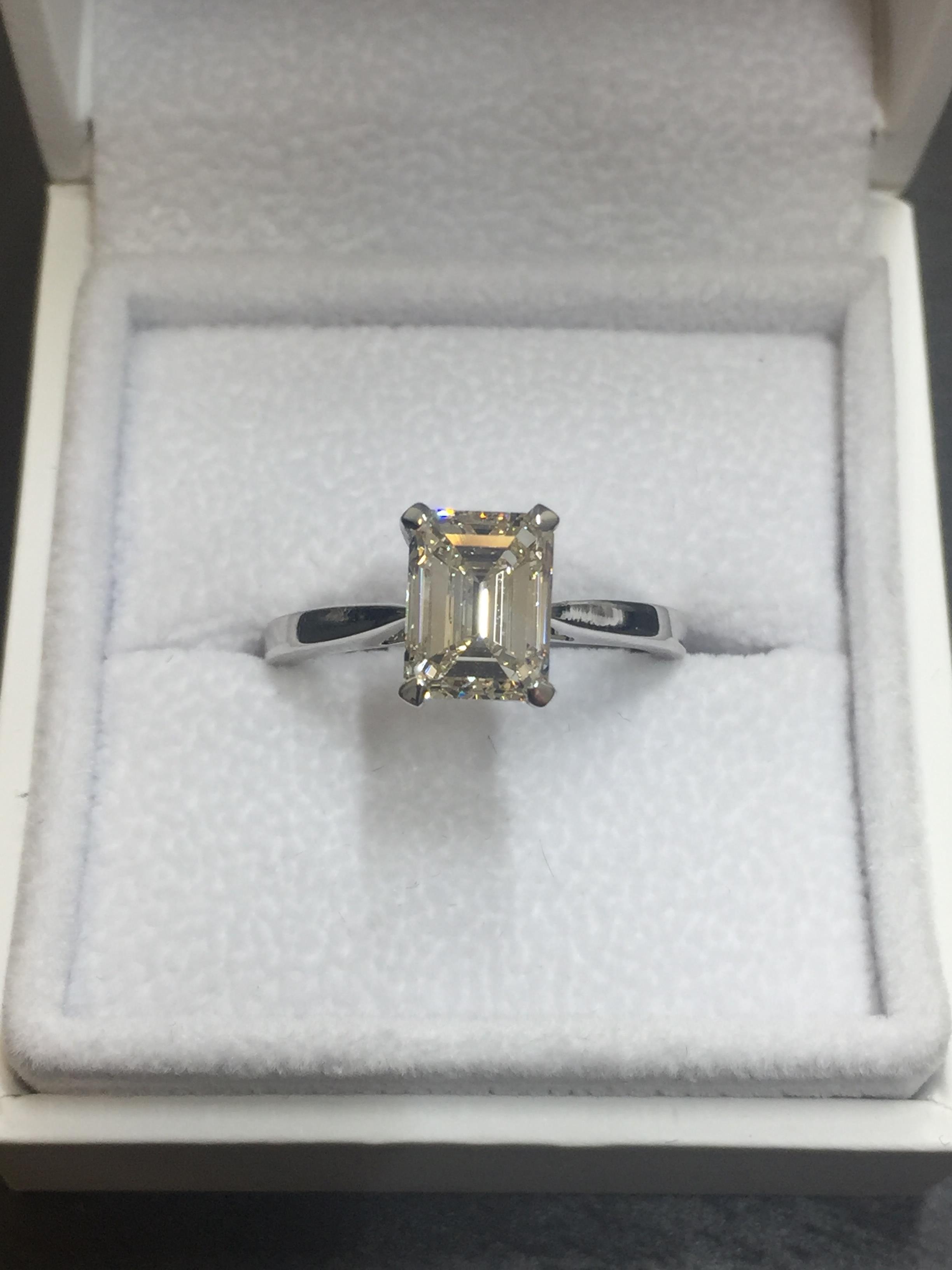 2ct diamond solitaire ring set with an emerald cut diamond, N ( light brown ) colour and VS1 - Image 2 of 3