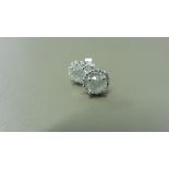2.00ct Diamond set solitaire style earrings. Each set with 1ct brilliant cut diamond ( enhanced