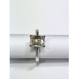 2ct diamond solitaire ring set with an emerald cut diamond, N ( light brown ) colour and VS1